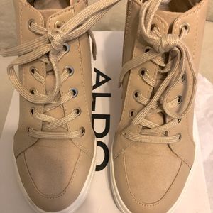 Khaki Aldo hidden wedge heel sneakers size 5.